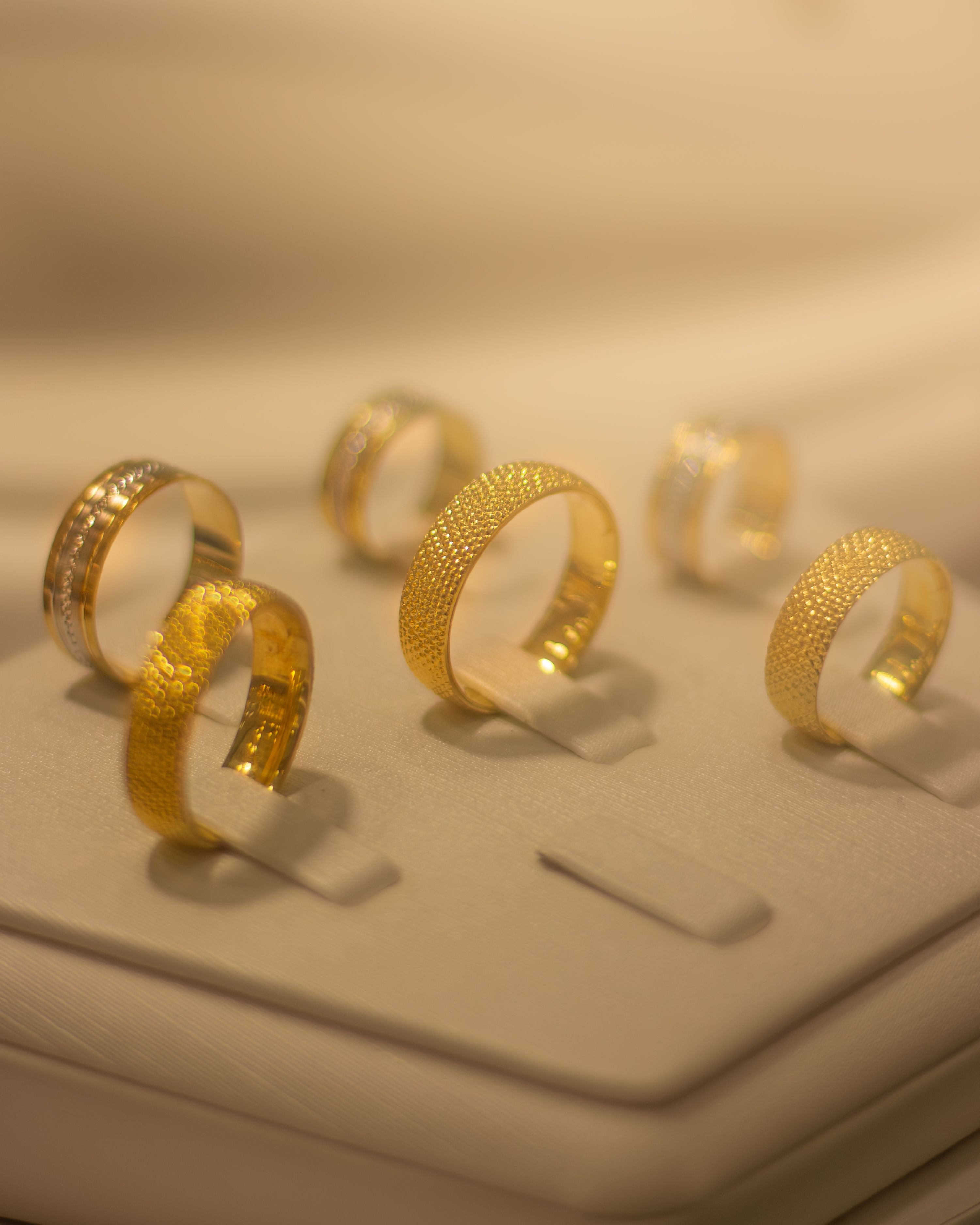 side-by-side gold jewelry karat stamps